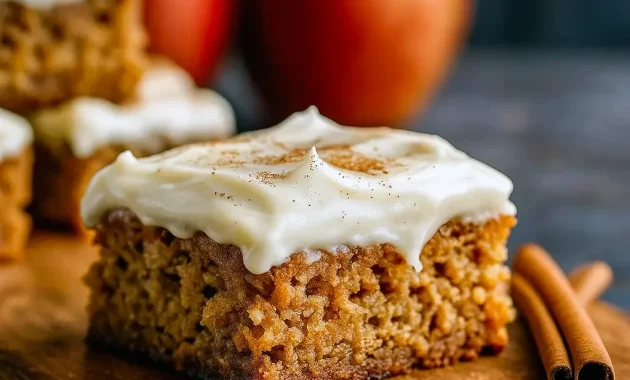 Close-up of gooey Maple Apple Desserts blondies with Cream Cheese Blondies Recipe frosting, perfect Fall Theme Recipes treat, a Call Dessert for Fall Blondies Recipe lovers, part of Best Fall Deserts and Unique Fall Dessert Recipes, ideal Fall Recipes With Apples and Fall Bake Recipes.