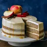 Slice of Apple Bourbon Cake with creamy frosting, showcasing a spiced Bourbon Apple Cider Cake perfect for Fall Cakes, Baking Sweets, and cozy Fall Baking moments.