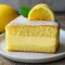 A beautifully layered Very Moist Lemon Cake with creamy lemon custard filling, garnished with zest and slices, perfect for fans of Lemon Custard Desserts and those looking for the Best Lemon Cake Recipe Moist.
