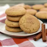 Stack of chai-spiced brown butter snickerdoodles with crackly cinnamon-sugar coating and soft, chewy centers.