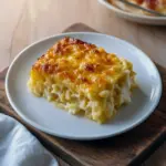 A bubbling dish of creamy spaghetti squash au gratin with a browned Parmesan crust, fresh thyme sprinkled on top — a cozy, low-carb side perfect for Cozy Side Dishes, featured in Healthy Low Carb Dinner Recipes Easy, and a smart swap for pasta as Sides For Spaghetti or in broader Squash Noodle Recipes. Serve it as a hearty Spaghetti Squash Dinner, try it in light Spagetti Squash Recipes Summer, add lean turkey for Ground Turkey Spaghetti Squash Recipes, or toss with sauce for Spaghetti Squash Spaghetti — a top pick among Health Spaghetti Squash Recipes.