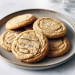 Soft and chewy Maple Butter Cookies with a shiny maple glaze, stacked on a plate — perfect Chewy Fall Cookies for cozy baking days and Giftable Baked Goods ideas.