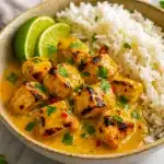 Rich and creamy Thai Peanut Dish served in a skillet with tender chicken coated in peanut sauce. A quick and flavorful option for Dinner Ideas Thai Food, made with Dinner Few Ingredients for an Easy Healthy Asian Dinner. Perfect example of Chicken Peanut Recipes and Dinner Chicken Recipes Healthy, great for weeknight meals or special Fresh Ginger Recipes Dinners.