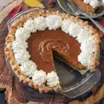 Pumpkin Caramel Pie Recipe close-up of a golden crust and glossy carameled top, styled as a Gourmet Pumpkin Pie with a Pumpkin Pie With A Twist — decadent Pumpkin Caramel Pie look inspired by an easy Dulce De Leche Pie Recipe Easy, playful Volcano Pie drizzle, hints of Salted Caramel Pumpkin Pie, subtle Mexican Pumpkin Pie spices, finished with a ribbon of Pumpkin Pie Caramel.