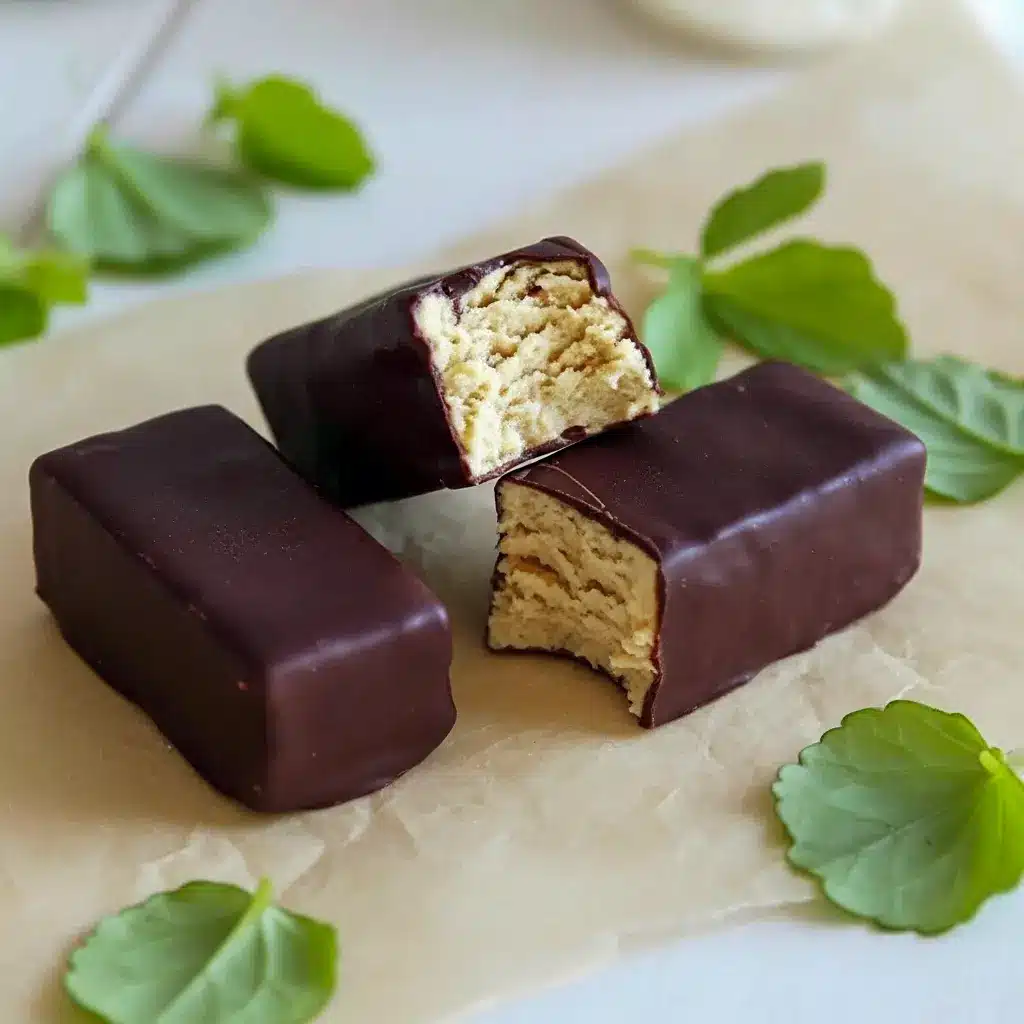 Greek Yogurt Protein Snack close-up: chocolate-coated peanut butter-yogurt bars on parchment, ideal Homemade Protein Snacks for meal prep, Healthy Sweet Protein Snacks.