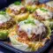 Overhead of a crispy cabbage burger bake: golden-roasted cabbage slices layered with seared patties and melted cheese — a tasty example of Meals With Cabbage and Cabbage Burgers Recipes Easy.