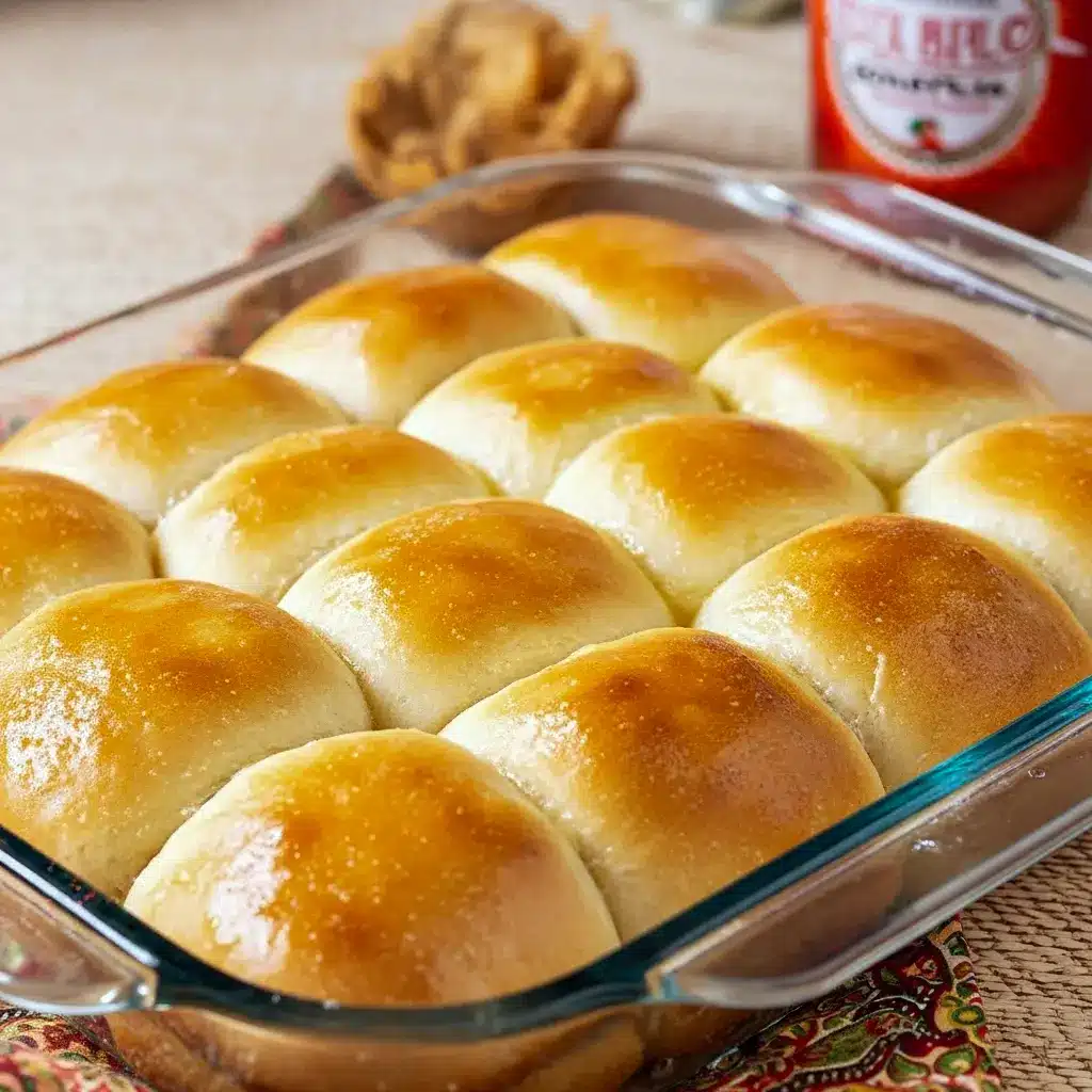 Easy Game Day Dinner Ideas: golden Buffalo Chicken Bombs on a platter, brushed with butter and served with blue cheese dressing and celery sticks.