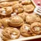 Close-up of a warm Peanut Butter Marshmallow Cookies cookie showing gooey marshmallow pockets and a tender, golden edge — a cozy Gluten Free Peanut Butter Dessert.