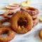 Plate of golden Apple Rings Recipe drizzled with cinnamon-sugar, showing the perfect way to Fry Apples for a warm, cozy treat.