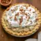 Slice of Pecan Cream Pie with whipped cream and toasted pecans on a plate — creamy filling and crunchy topping, a classic Pies With Cream Cheese dessert.