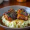 Plated Chipotle Honey Chicken Thighs glazed and caramelized beside creamy smoked Gouda mashed potatoes — a cozy, Cozy Chicken style Chicken Thigh Dishes For Dinner shot ready to tempt your feed.
