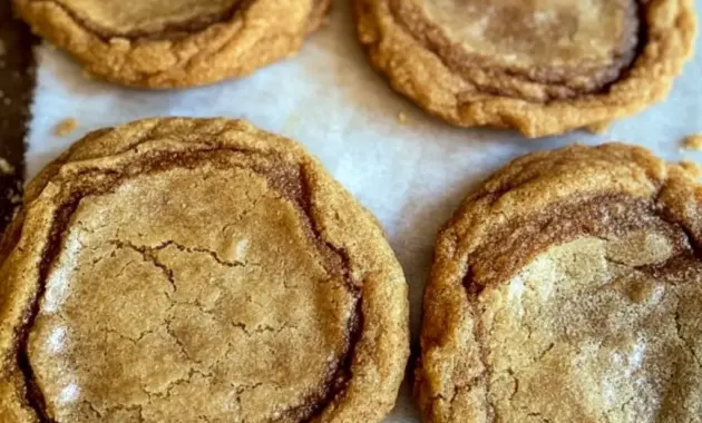 Brown Butter Cinnamon Cookies stacked on a plate with golden edges and a soft center, showing a warm homemade treat perfect for Sweet Snacks and Christmas Baking.