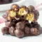 Chocolate Chickpeas in bite-sized clusters coated with dark chocolate, showing a crunchy Sweet Chickpeas Snack and an easy Chocolate Chickpea Clusters dessert.