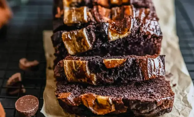 A slice of Chocolate Espresso Banana Bread with melted chocolate chips and a soft, rich crumb, shown as a decadent Bread Recipes Sweet treat on a plate.
