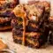 Biscoff Brownies with a gooey center and rich chocolate layers for an easy Biscoff Brownie Recipe.