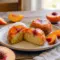 Peach Upside Down Mini Cakes fresh from the pan, styled as a sweet Small Peaches Recipe for summer baking.