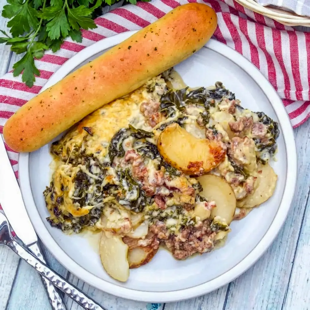 A hearty family-style dish of Zuppa Toscana Casserole perfect for Warm Comforting Meals on chilly evenings.
