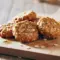 Best Pumpkin Spice No Bake Cookies — Super Easy Fall Desserts Everyone Loves Close-up of no-bake pumpkin spice oat cookies on parchment, drizzled with chocolate and sprinkled with cinnamon — perfect No Bake Thanksgiving Treats.