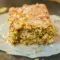 Cinnamon Roll Baked Oatmeal — A Cozy Cinnamon Roll Bake For Chilly Mornings Close-up of golden-baked cinnamon-swirl oatmeal squares with a light glaze — a comforting Cinnamon Roll Bake that's also ideal for Dairy Free Breakfasts, listed under top Baked Oatmeal Recipes, pairs well with Tofu Scramble, and works as a Gluten Free Sugar Free option for Free Snacks, simple Gluten Free Breakfasts, and everyday Oatmeal Recipes.