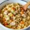 Creamy Chicken Pot Pie Pasta — Cozy Pasta Dinner Recipes Close-up of egg noodles tossed in a creamy sauce with peas, carrots, and shredded chicken, sprinkled with parsley — a hearty, homey Main Dish Recipes photo that reads like the best One Pot Meals comfort and an easy, crowd-pleasing Chicken Dinner.