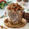 A festive jar of Gingerbread Granola With Oats filled with golden clusters, nuts, and warm spices — the perfect Healthy Homemade Christmas Granola for the holidays.