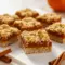Irresistibly Soft Pumpkin Oatmeal Bars You’ll Want All Fall Long2 Close-up of golden Easy Pumpkin Oatmeal Bars with a creamy pumpkin center and crumbly oat topping — the ultimate cozy fall treat from a simple Pumpkin Oatmeal Bar Recipe.