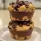 Close-up of golden peanut butter chocolate chip cookie cups cooling in a muffin tin — a tempting shot for Unique Dessert Recipes Baking boards, Unique Desert Ideas, and lists of Things To Make With Cookie Dough (yes, even cheeky roundups like Desserts That Go With Fish for adventurous menus).