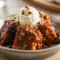 Pumpkin Pudding Cake - Cozy Dessert Ideas With Caramel Sauce A warm slice of Pumpkin Pudding Cake served in a bowl with gooey caramel sauce pooling beneath, topped with a scoop of vanilla ice cream — the perfect cozy dessert for fall fans searching for Dessert Ideas With Caramel Sauce and the ultimate Pumpkin Spice Cake With Caramel Sauce experience.
