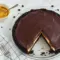 Skrewball Pie — Salted Chocolate Peanut Butter Pie with a Boozy Twist Slice of Skrewball pie with Oreo crust, whipped peanut butter filling and shiny chocolate ganache, garnished with chopped peanuts and flaky salt.