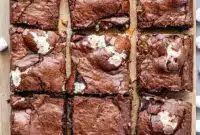 Addictive Peanut Butter Marshmallow Brownies – A Must-Bake Favorite1 Close-up of gooey layered brownies inspired by Fluffernutter Dessert, showcasing rich chocolate with fluffy marshmallow and creamy peanut butter, similar to Fluffernutter Brownies and stylish Fluffernutter Cookie Bars, perfect for fans of Recipes With Fluff and nostalgic Fluffernutter Recipes.