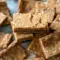 A pan of chewy Ginger Molasses Cookie Bars topped with sparkling sugar, the perfect Molasses Bar treat for cozy Holiday Bars Recipes baking days.