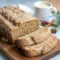 Moist holiday banana bread drizzled with creamy eggnog glaze, inspired by festive Recipe With Eggnog, perfect for Banana Christmas Desserts and cozy Winter Banana Bread ideas.