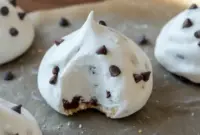 Popular Cookie Flavors – Classic Forgotten Cookies Everyone Will Be Obsessed With1 Plate of airy meringue-style Chocolate Christmas Recipes with swirls of chocolate and vanilla, showcasing the Popular Cookie Flavors of classic Divinity Cookies Recipe — delicate Two Tone Cookies that make beautiful Quick Homemade Desserts for cozy Desserts Winter celebrations.