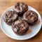 Close-up photo of High Protein Brownie Bites in a mini muffin pan, rich and chocolatey with a soft, fudgy center, showing a healthy bite-sized treat perfect for snacking.