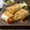 Golden toasted burritos filled with seasoned ground chicken, fluffy rice, and melted cheese, sliced open to show a warm, hearty filling perfect for busy weeknight dinners.