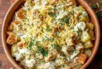Cheesy garlic skillet showcasing Garlic Chicken With Potatoes prepared as Meal Prep Recipes With Potatoes, perfect for Weekly Dinners For Family and satisfying Cheap Easy Delicious Meals that support Easy High Protein Recipes Dinner and Protein Recipes Healthy Dinner goals with tender chicken and golden potatoes.