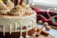 Unbelievable Christmas Spice Cake Recipes with Silky Eggnog Buttercream2 A tall, festive Christmas spice cake topped with creamy eggnog buttercream, decorated with warm spices and holiday accents.