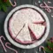 A creamy pink peppermint candy cane pie in an Oreo crust, topped with whipped cream and crushed candy canes — a festive Minty Christmas Desserts style treat perfect for holiday celebrations.