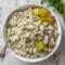 Bowl of creamy dill pickle chicken salad made with shredded chicken, crunchy pickles, and fresh herbs — a flavorful recipe featuring Dishes With Pickles, perfect for easy lunches and busy-day meal prep.
