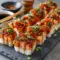 Spicy salmon sushi bake topped with creamy sauce and garnishes, styled for an Easy Dinner Salmon dish with bold flavor, perfect for saving as Fit Food Recipes inspiration.
