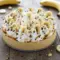 Slice of creamy banoffee pie topped with whipped cream and bananas, perfect for dessert inspiration, featuring Banoffee Pie Ideas, a Super Easy Banoffee Pie, a clear look at What Ingredients Do You Need For Banoffee Pie, and irresistible Banoffee Pie Recipe Inspiration.