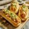 Crawfish Rolls filled with seasoned Crawfish Tails, creamy dressing, and fresh herbs served in toasted rolls, showcasing one of the most irresistible Recipes With Crawfish Meat for a flavorful Cajun-style meal.