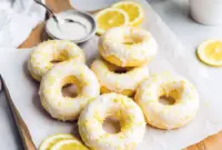 Freshly baked Glazed Protein Donuts topped with lemon vanilla glaze, a healthy and Healthy Protein Donut Recipe that’s gluten free, protein-packed, and perfect for an easy breakfast or snack.