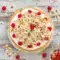 A slice of Cream Pies No Bake dessert showing a rich Almond Cream Pie with fluffy layers, toasted almond topping, and cherries, inspired by a classic Amaretto Pie Recipe and served chilled for a decadent no-bake finish.