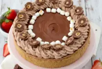 Slice of Nutella marshmallow pie in a graham cracker crust, inspired by Mini No Bake Pies Graham Crackers, styled as a festive Christmas Pie Graham Cracker Crust dessert. A fluffy chocolate filling makes it one of the best Things To Make With Fluff, perfect for fans of creamy Treats With Marshmallow Fluff.