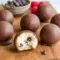 High Protein Snacks Desserts made with cottage cheese protein balls dipped in chocolate, a no-bake option for Protein Packed Desserts and Protein Snacks For Adults looking for a sweet, satisfying bite.