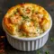 Creamy shrimp and lobster Seafood Pot Pie with a golden cheddar bay biscuit crust, baked until bubbly and served as a comforting Seafood Dinner, featuring tender Shrimp Dishes in a rich sauce, ideal for elegant Seafood Dish Recipes, cozy Fish Dinner ideas, and impressive Seafood Dishes for family meals.