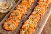 Close-up of golden Keto Cheese Snacks Easy everything bagel cheese chips baked until crisp, showcasing crunchy edges and seasoning — a savory low-carb snack inspired by Keto Snacks Chips and Keto Everything Bagel Chips.