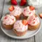 Soft pink Keto Strawberry Cupcakes swirled with rich Low Carb Strawberry Frosting, styled as elegant Sugar Free Strawberry Cupcakes bursting with fresh strawberry flavor.
