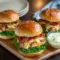 Golden, crispy Honey Mustard Chicken sliders stacked on a platter with soft buns, creamy sauce, and fresh toppings—perfect for Family Dinner, easy Slider Recipes, and unforgettable Yummy Dinners at Dinner Time.